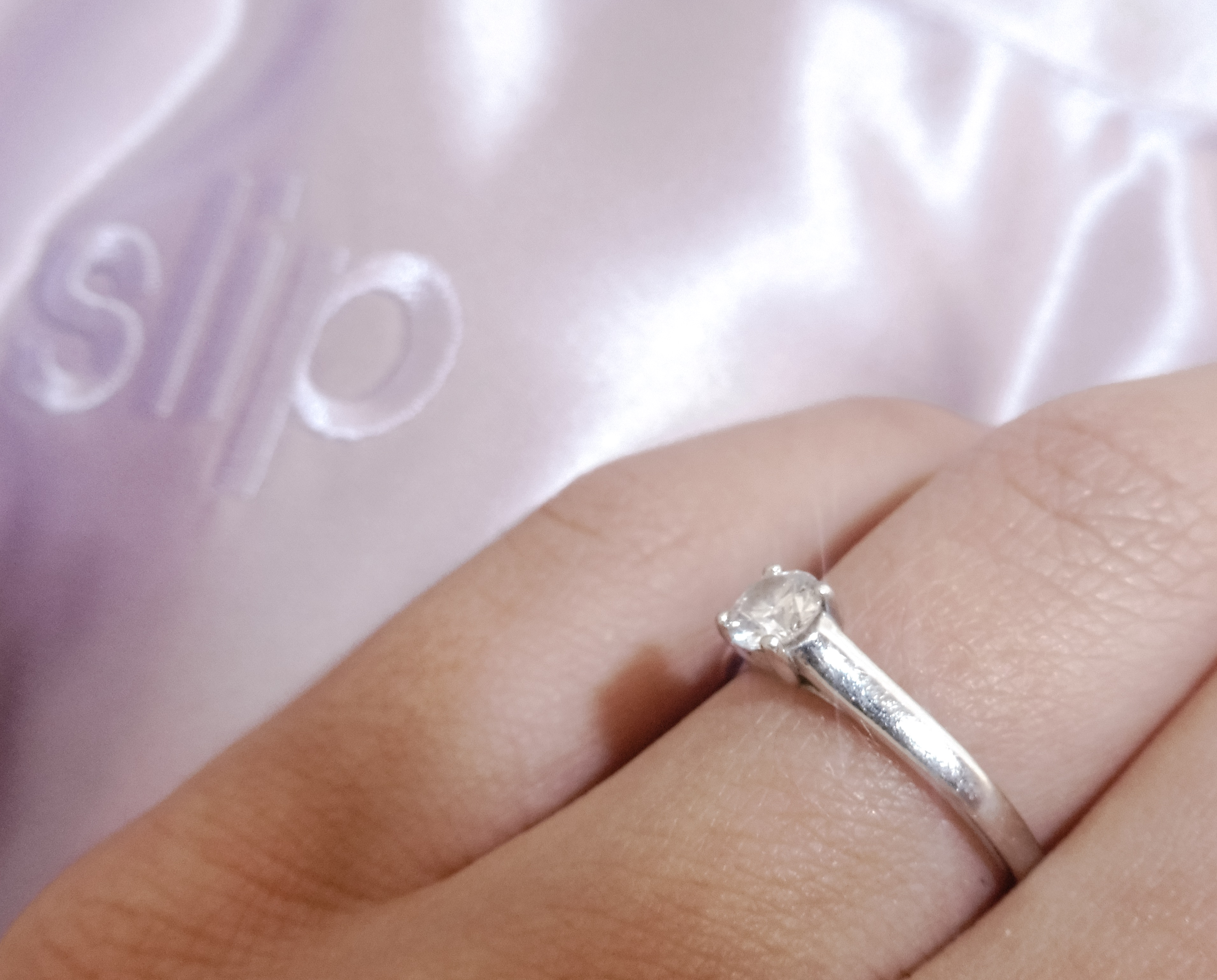 engagement ring and slip silk pillowcase