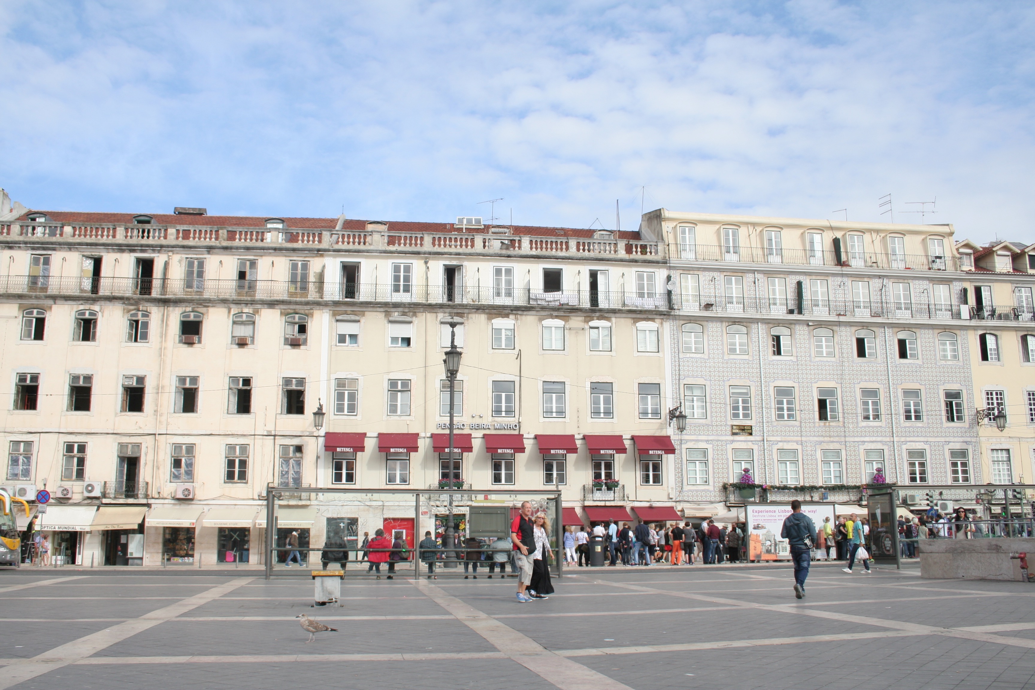 houses and blue sky in square of lisbon