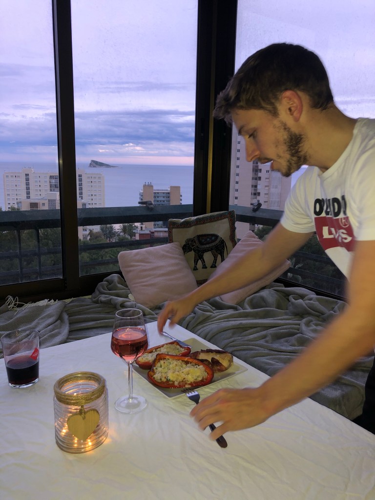 Alex setting the table in lockdown 