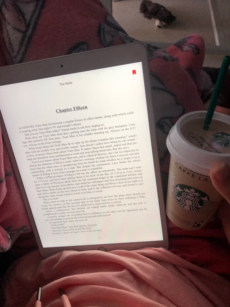 Trying to read my book with Starbucks coffee 
