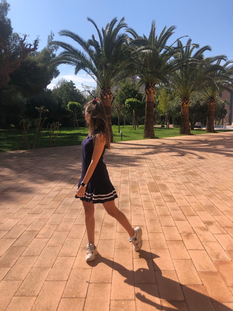 Tommy Hilfiger dress and trainers in garden Benidorm 