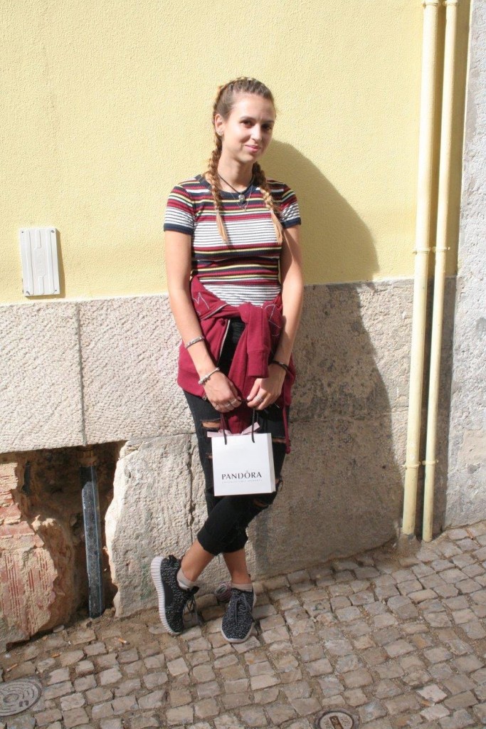 Standing  by yellow wall Lisbon 