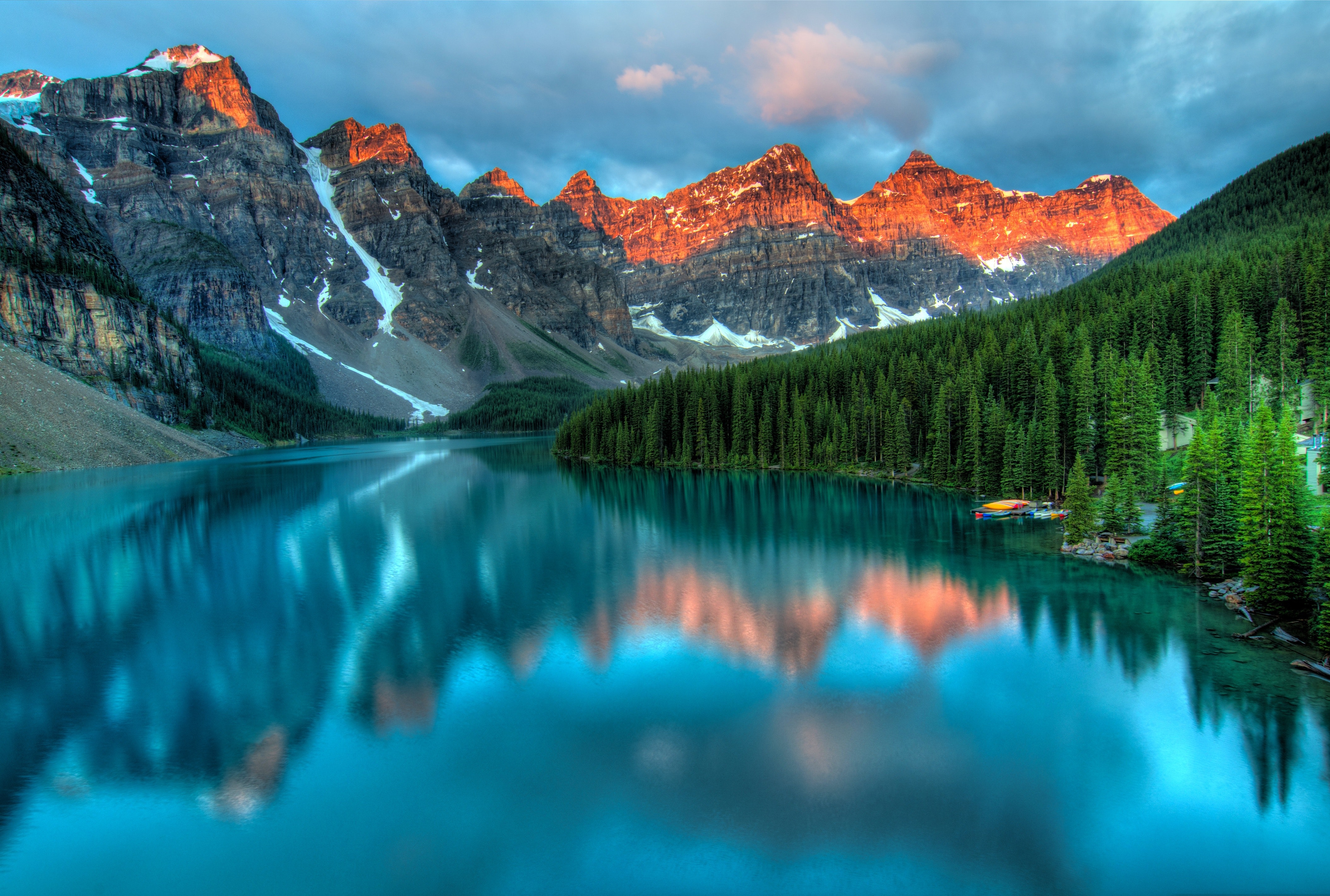 alberta lake with orange mountains
