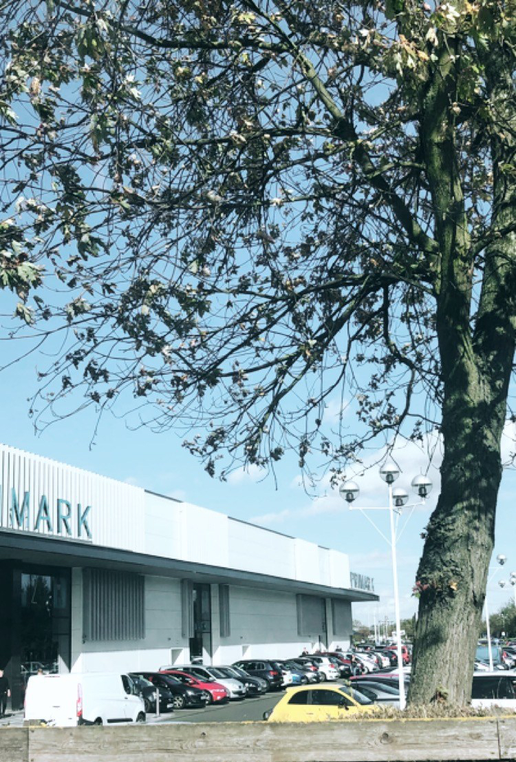 fosse park in autumn with primark