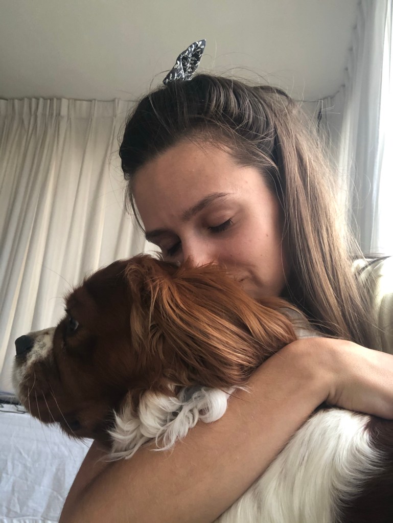 Cuddling Rio in Lockdown cavalier  King Charles spaniel 