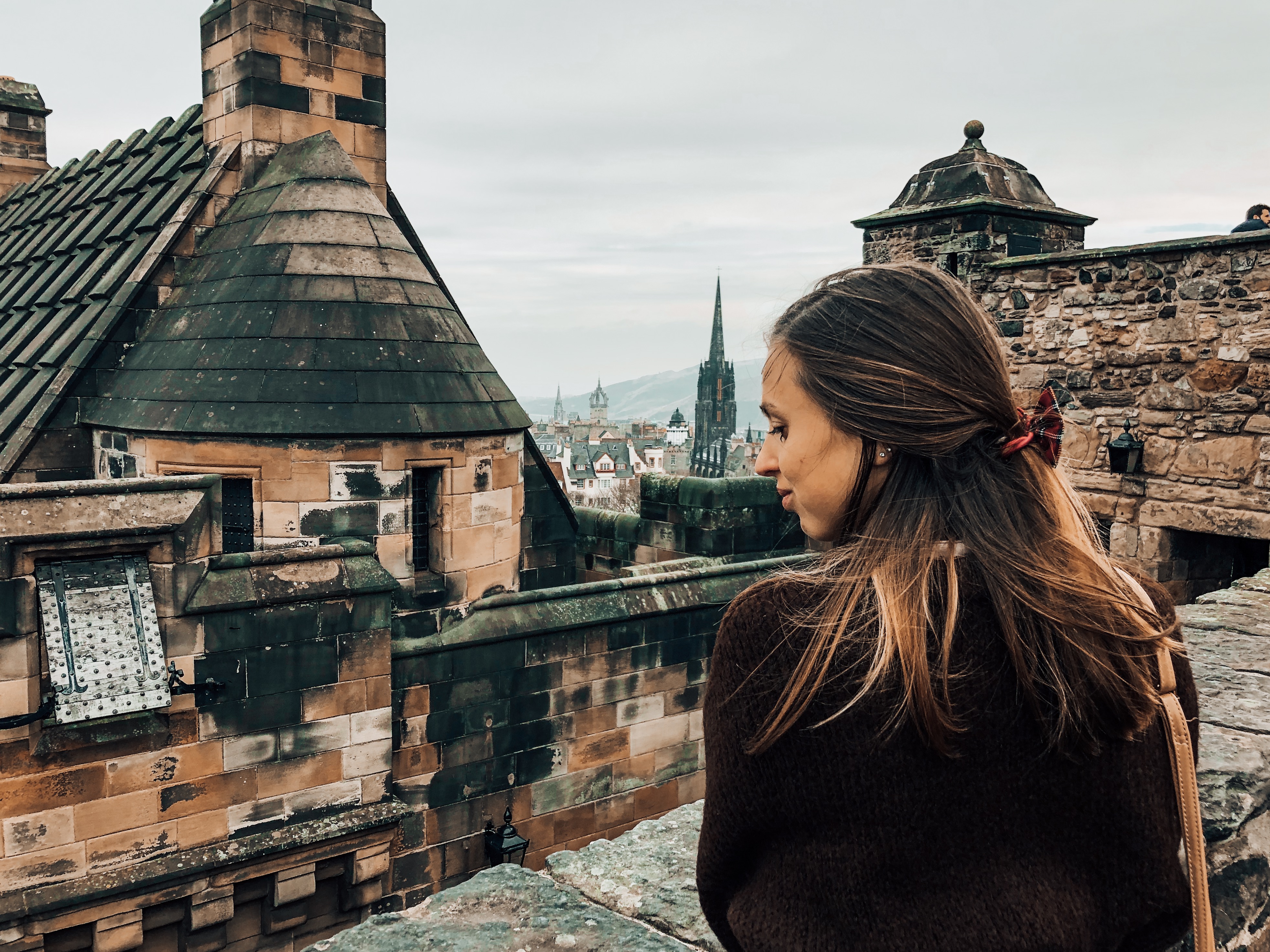 looking at edinburgh castle and mountains