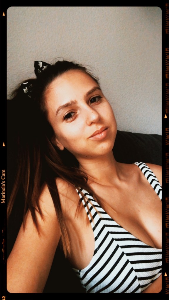 Hot in bikini after sunbathing on balcony 