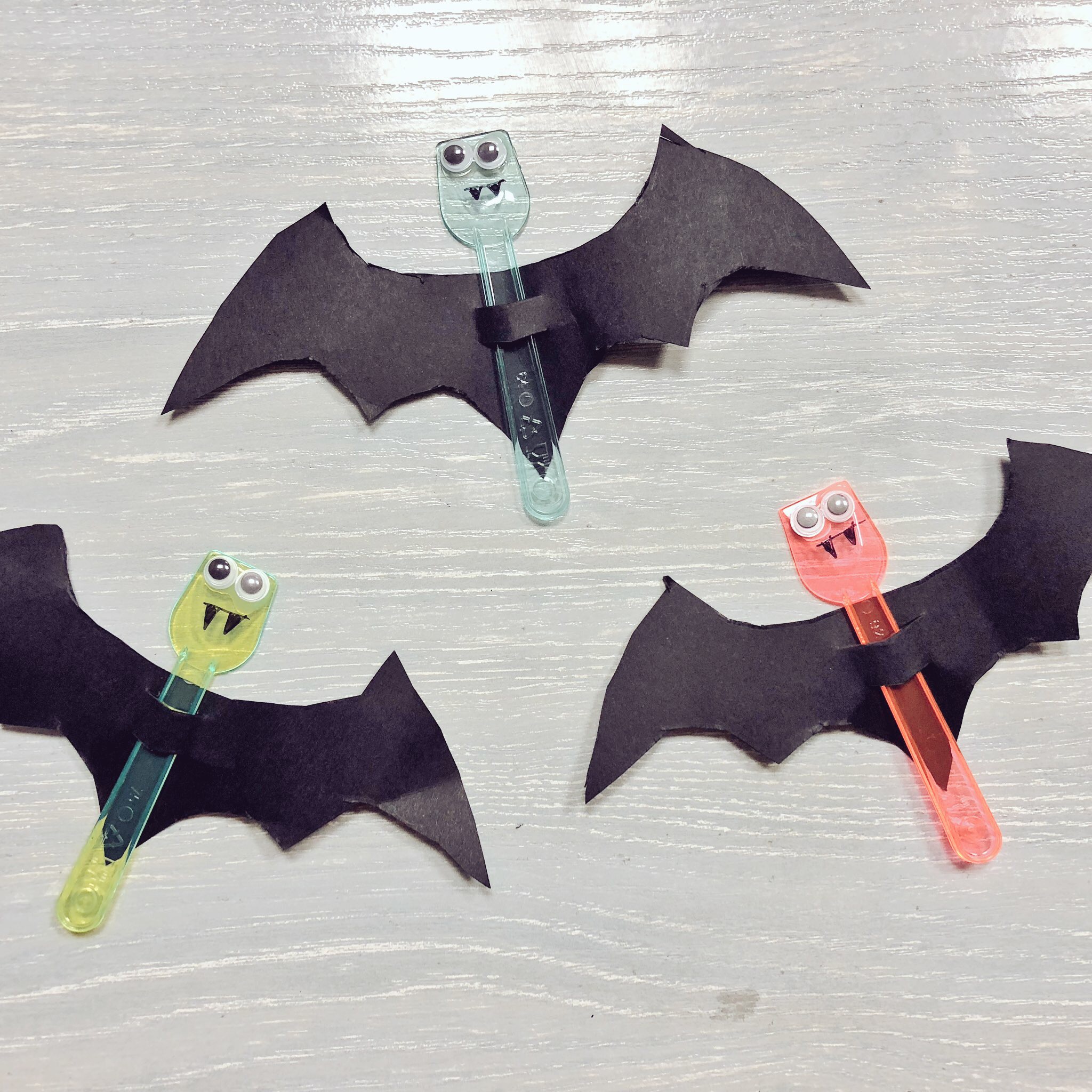3 bats made with plastic, google eyes and paper