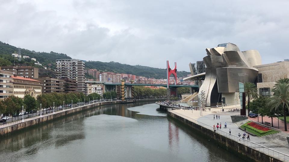 view of guggenheim museum bilbao and river spain