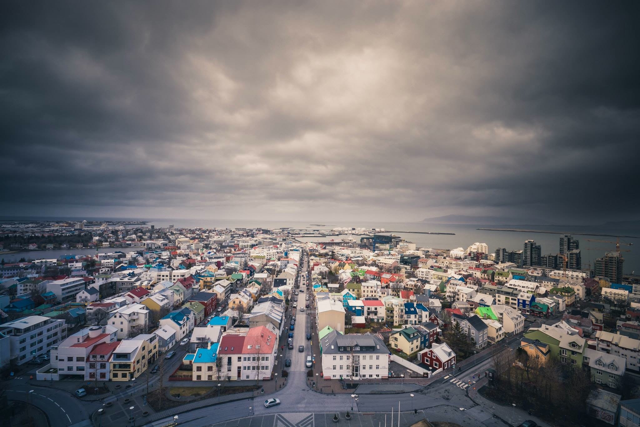 clouds and houses of iceland in winter grey clouds