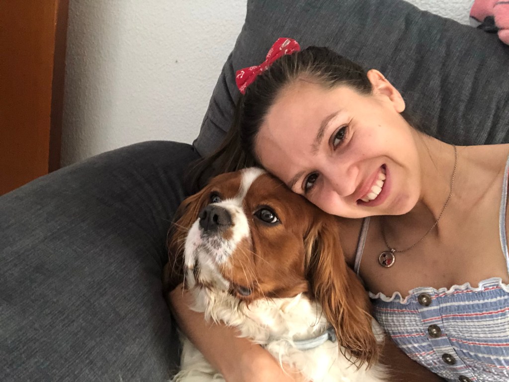 Cuddling my King Charles cavalier spaniel 