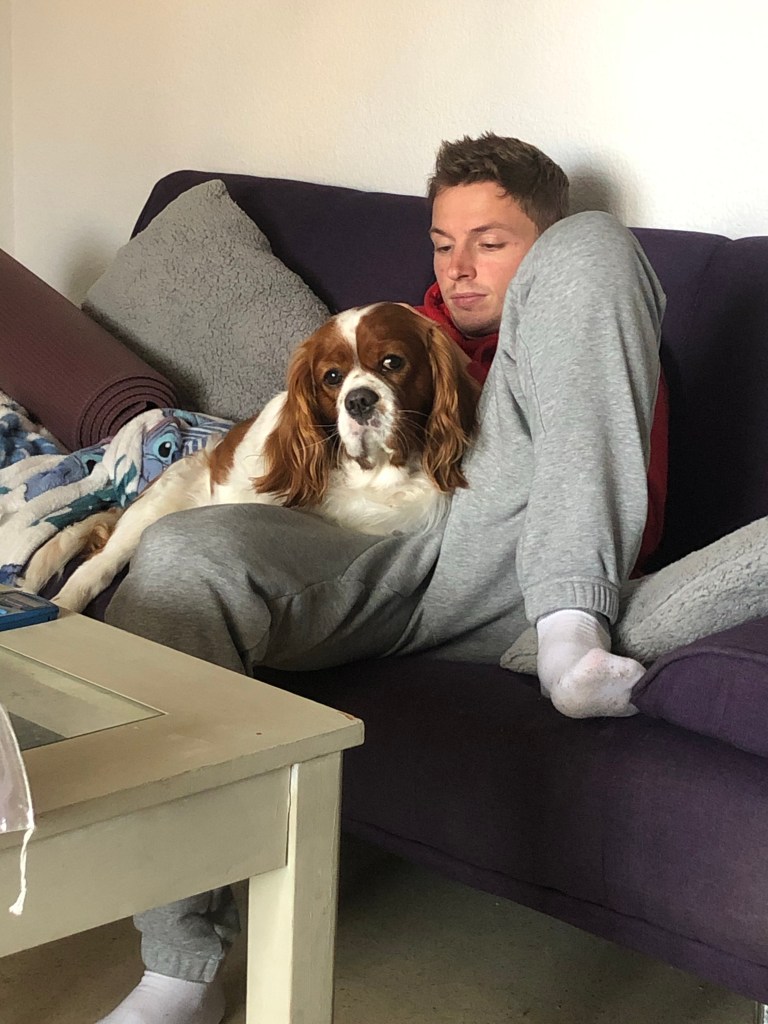 Rio sitting with Alex on sofa 