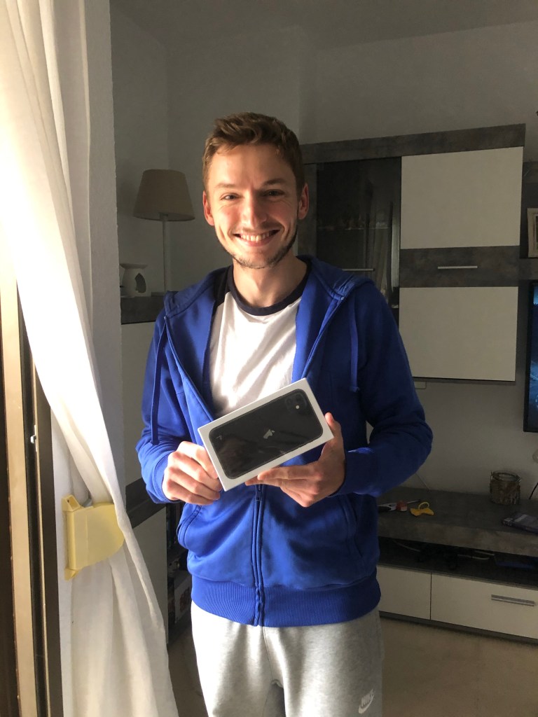 Alex and his new phone in lockdown 