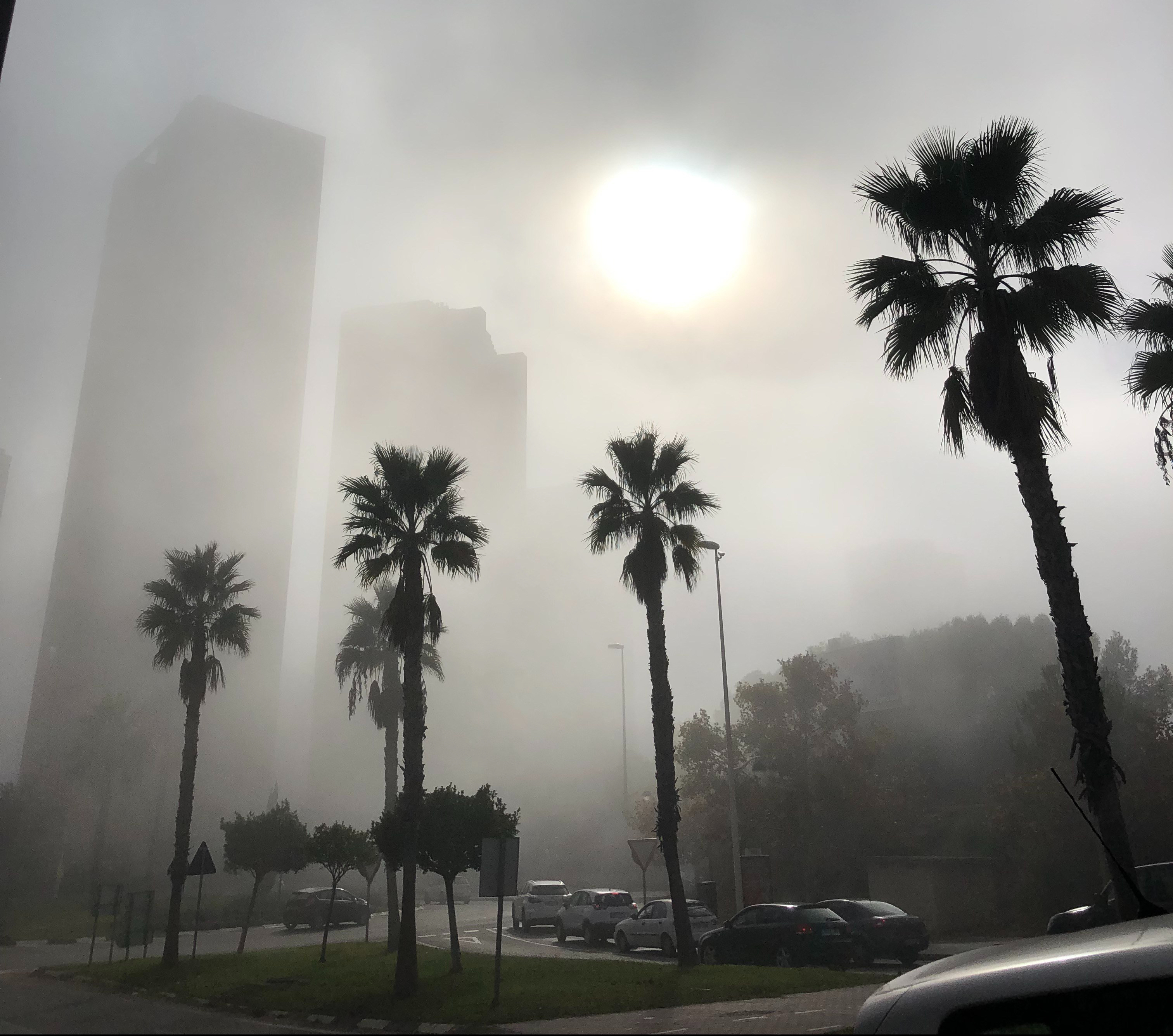 sea fret fog in benidorm weather in december building hidden