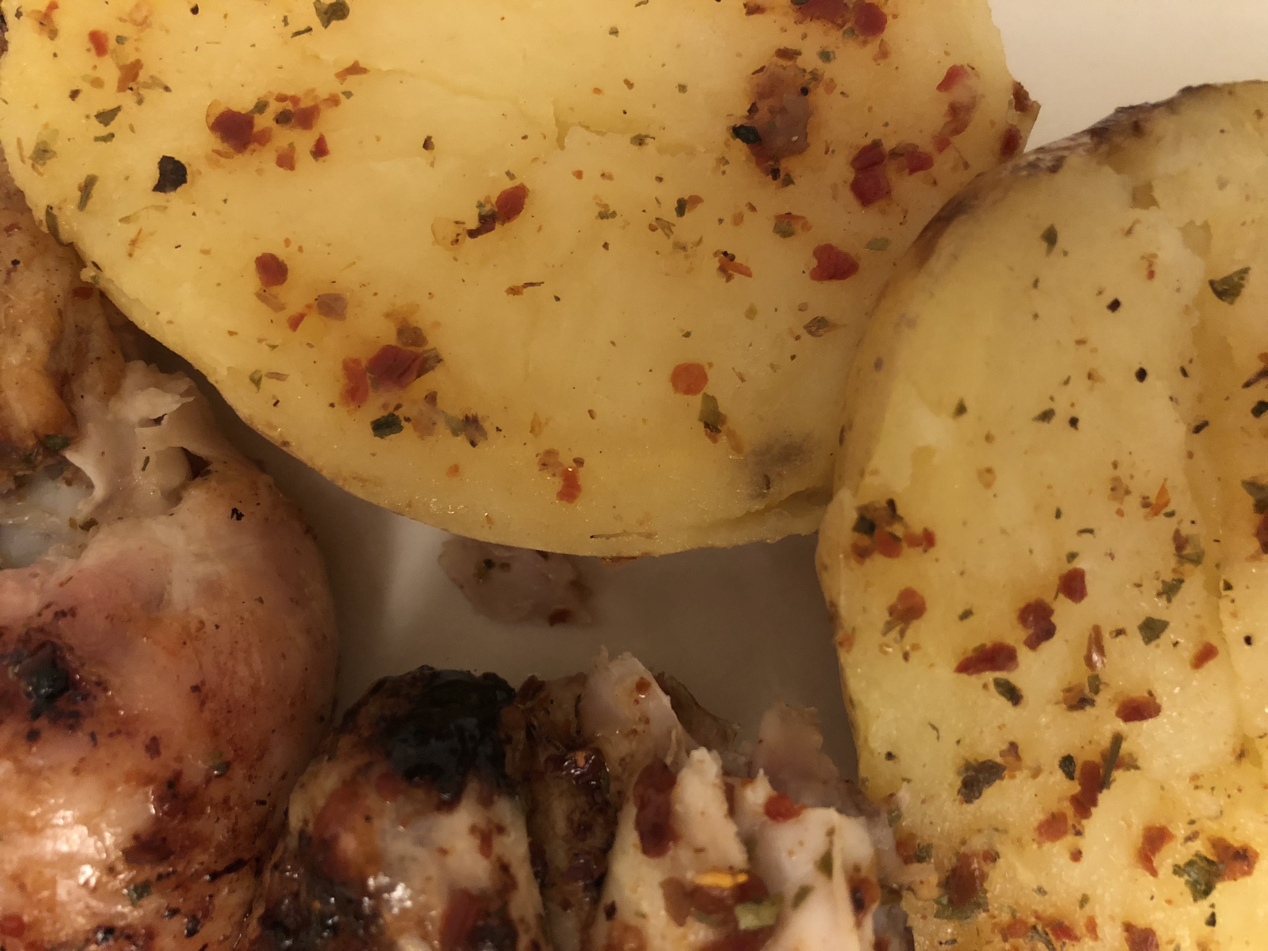 roast potatoes patatas asadas and chicken pollo a la brasa