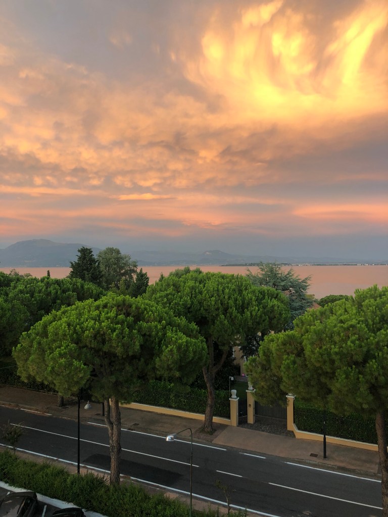 beautiful sunset over desenzano del garda travel guide