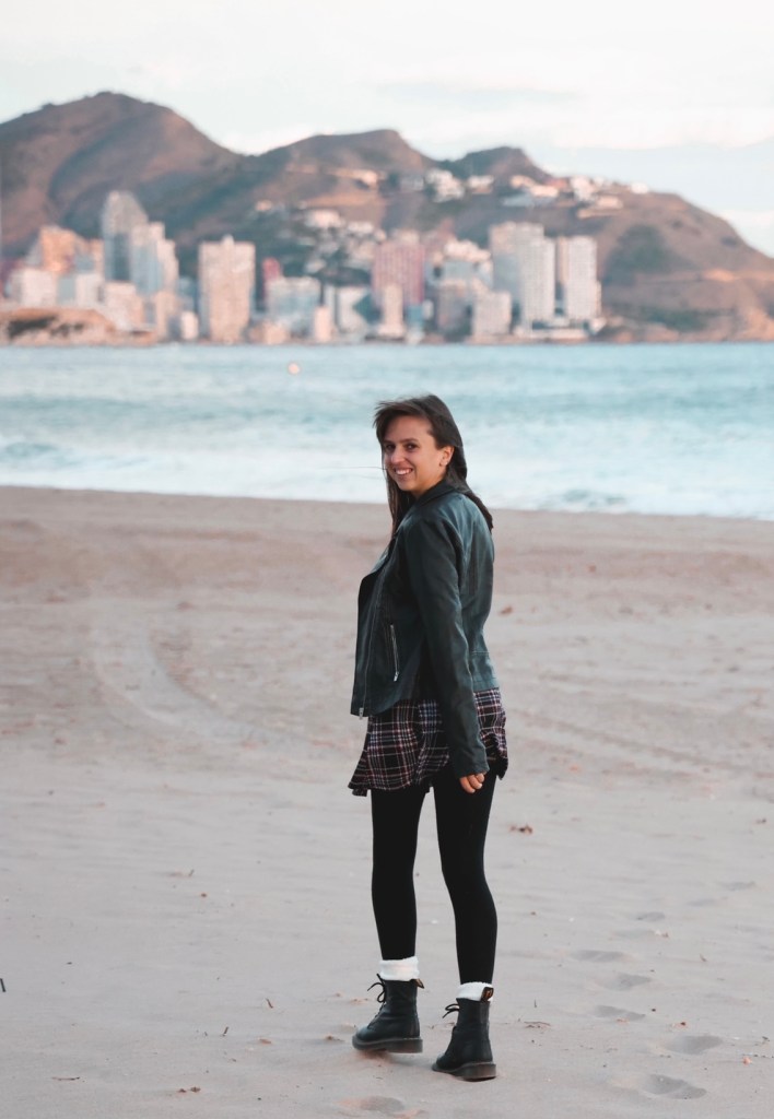 The sea has healing effects Lauren diary of a Spanglish girl walking along poniente beach with benidorm in the background 